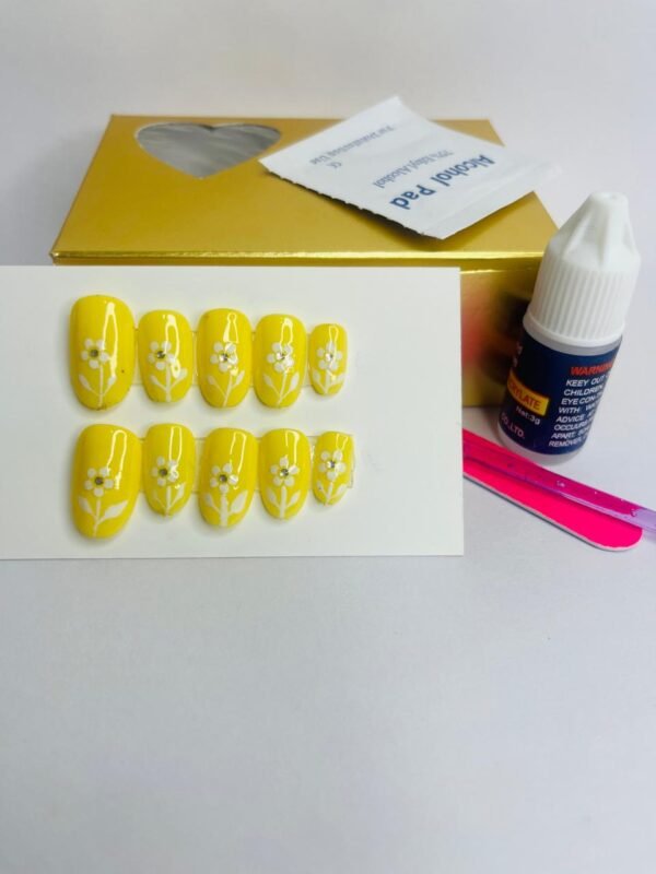 Best press on nails in yellow color with flower art